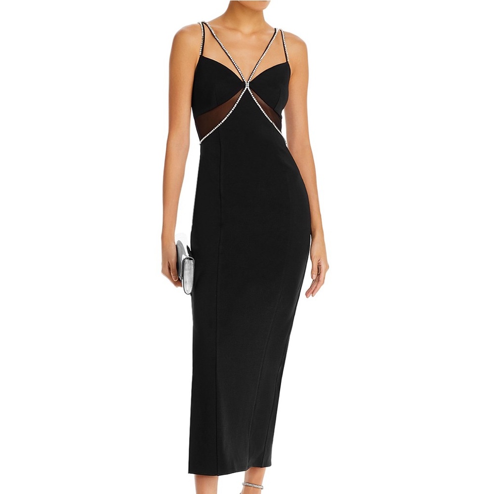 Black form fitting dress with crystal embellishment